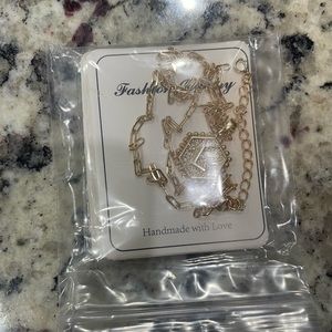 Letter L gold necklace